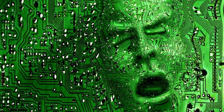 Here’s When Humanity Will Reach It, According to New Data Face Emerging From Circuit Board Royalty Free Image 1674427158.jpg