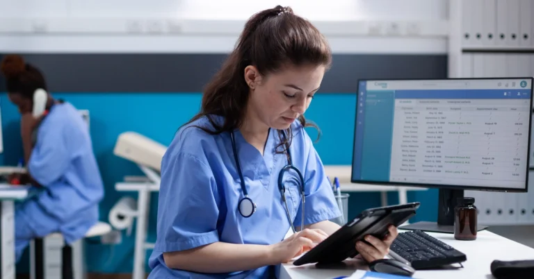 Health System Size Impacts AI Privacy and Security Concerns 3087481 young nurse checking appointments list on digital tablet in busy medical office 5a820f19c4.webp