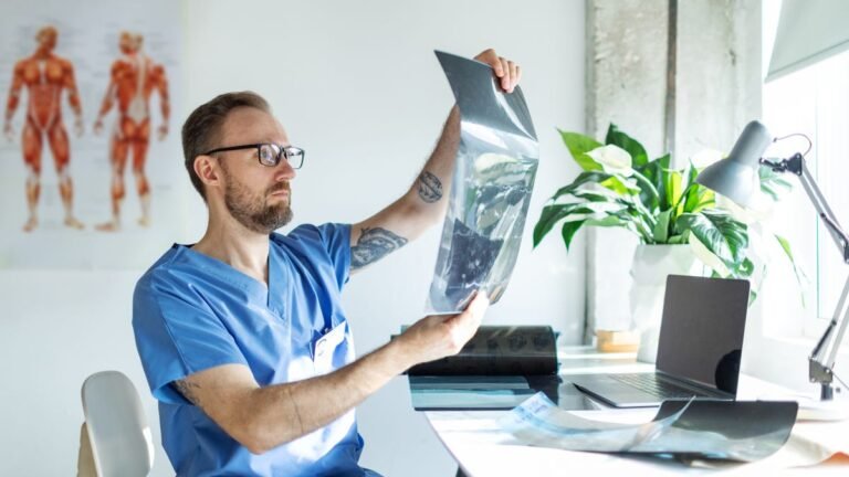 87406585007 healthcare professional inspecting charts.jpeg