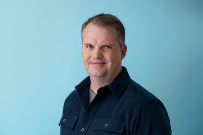 4 strategies to scale AI and increase efficiency by 10 Justin headshot scaled.jpg