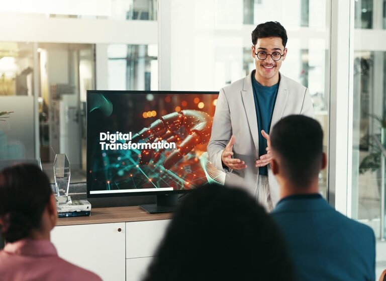 Transformative AI: Case Studies and Lessons Learned Man doing digital transformation presentation.jpg